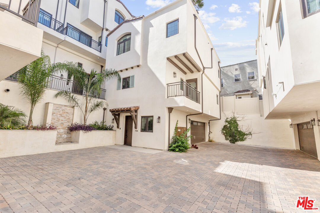 a view of a building with a street