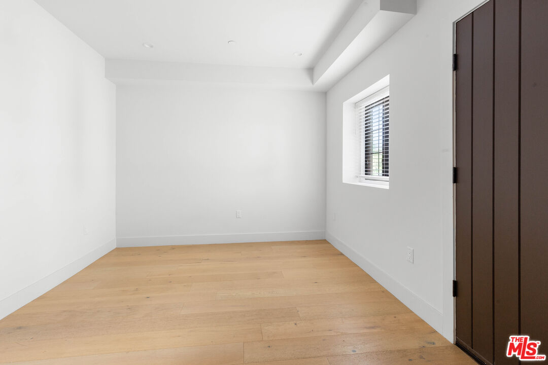736 Parkman Avenue Los Angeles, CA 90026 - Photo 6 of 34 an empty room with windows