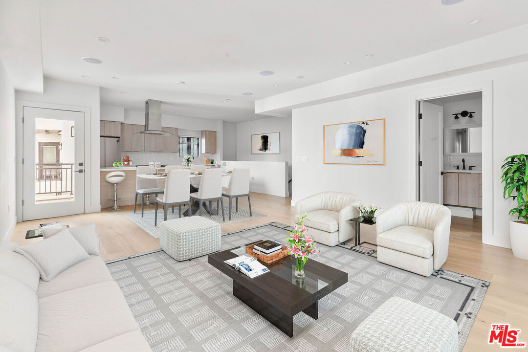 736 Parkman Avenue Los Angeles, CA 90026 - Photo 9 of 34 a living room with furniture and view of kitchen