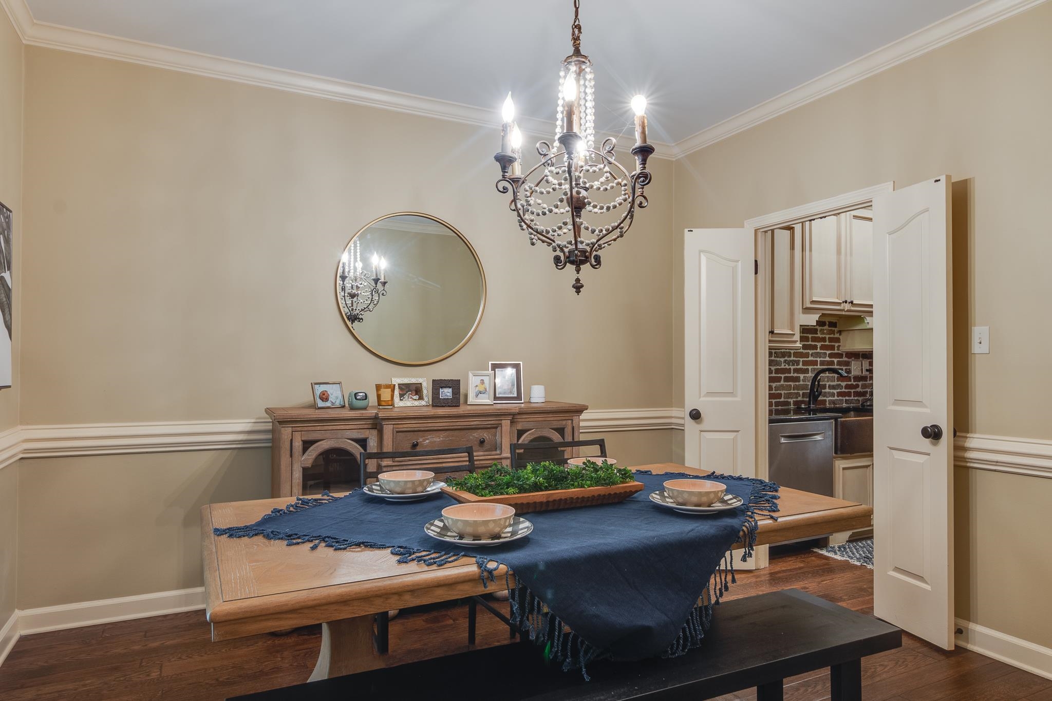 791 North Tree Drive Collierville, TN 38017 - Photo 4 of 27 Formal dining area featuring hardwood flooring and extensive crown molding