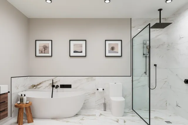 a bathroom with a bathtub and a shower