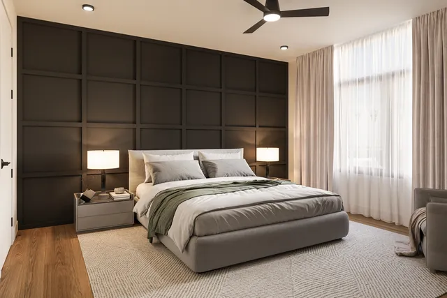 a spacious bedroom with a bed and a window