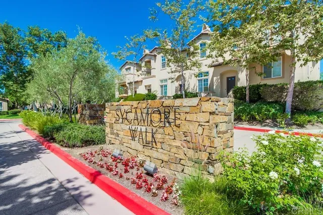 a large building with trees in front of it