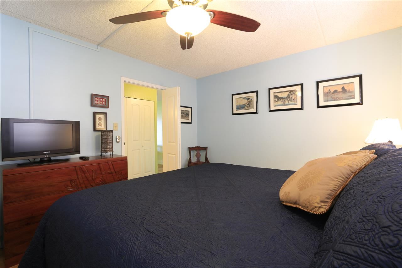 2387 South Kihei Road, Unit C302 Kihei, HI 96753 - Photo 14 of 17 a bedroom with bed and window