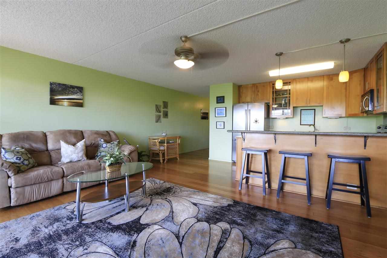 2387 South Kihei Road, Unit C302 Kihei, HI 96753 - Photo 10 of 17 a living room with furniture wooden floor and a dining table