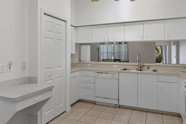 a en suite bathroom with a sink a mirror and a shower