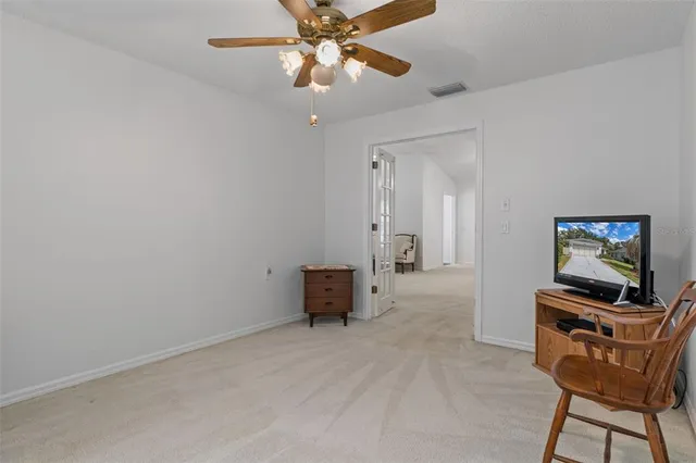a bathroom with a shower and a sink