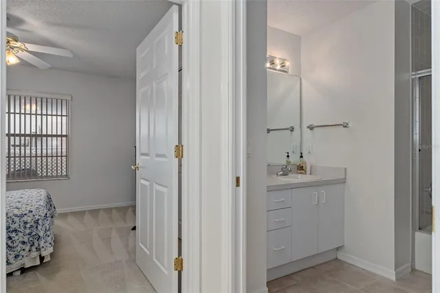 a front view of a house with a yard and plants