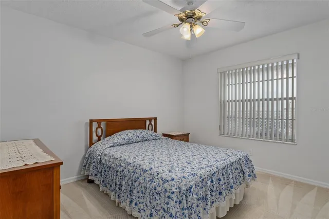 a front view of a house with a garden and porch
