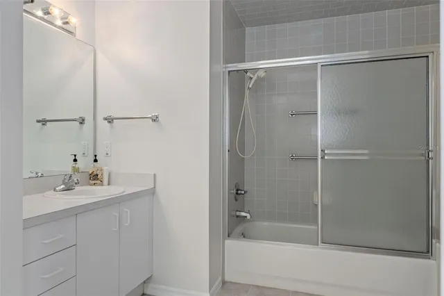 a swimming pool with outdoor seating and yard