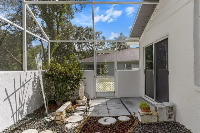 a view of a lake with houses in the background