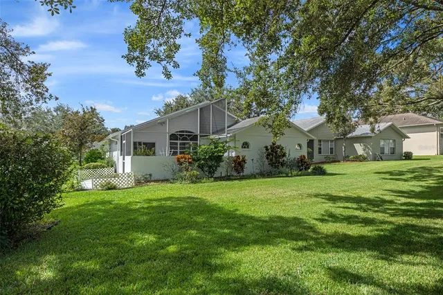 a view of a park with iron fence