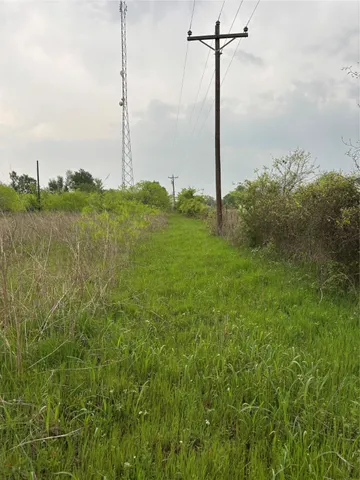 a view of a field with an outdoor space