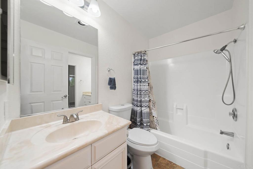 2636 Alpine Boulevard, Unit C Alpine, CA 91901 - Photo 15 of 35 a bathroom with a sink toilet and shower