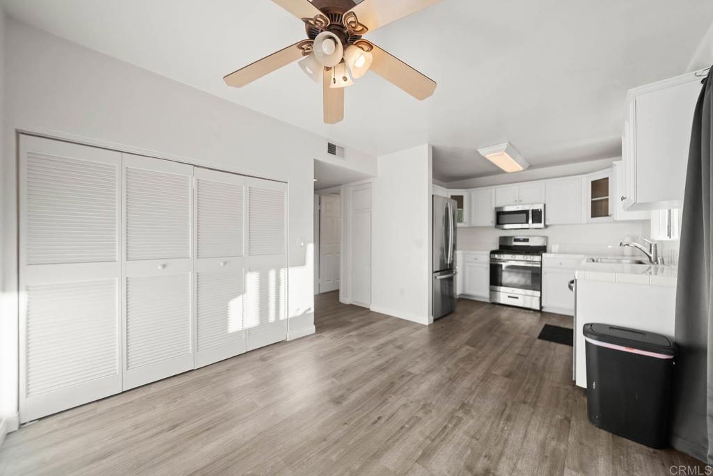 2636 Alpine Boulevard, Unit C Alpine, CA 91901 - Photo 2 of 35 a view of a kitchen with wooden floor and a refrigerator