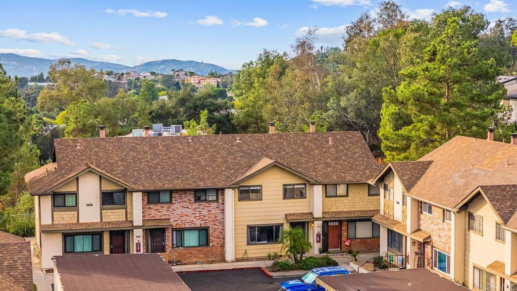 2636 Alpine Boulevard, Unit C Alpine, CA 91901 - Photo 28 of 35 a aerial view of a house next to a big yard