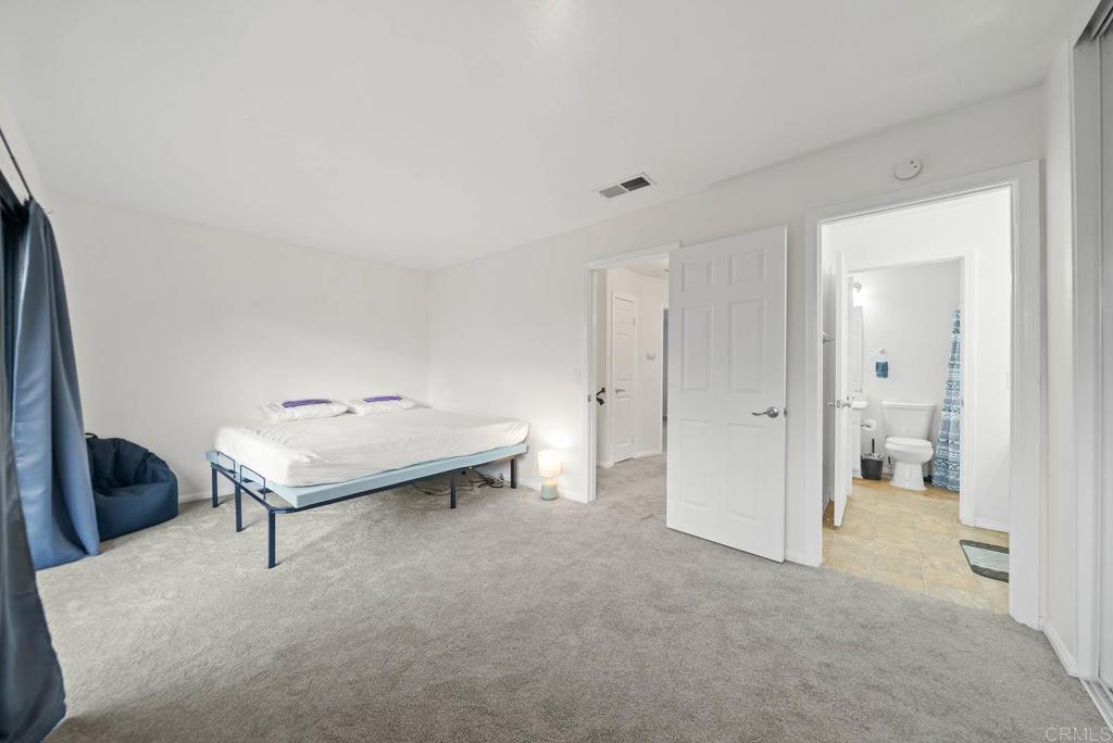 2636 Alpine Boulevard, Unit C Alpine, CA 91901 - Photo 7 of 35 a living room with furniture and a walk in closet