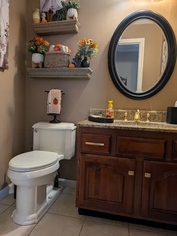 a bathroom with a toilet and a sink