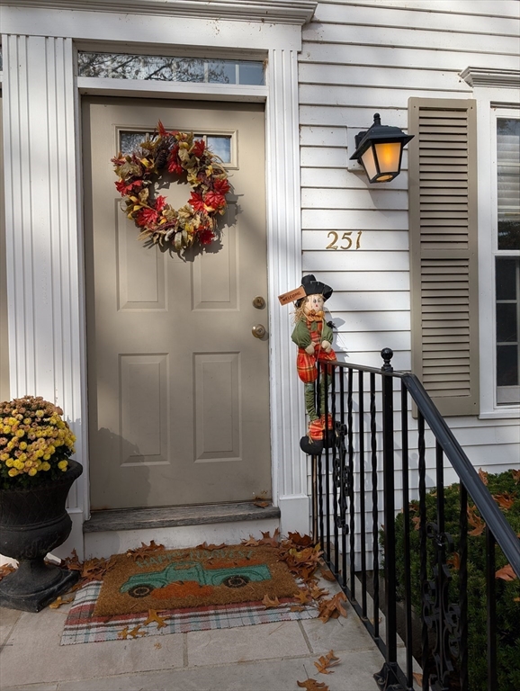 251 Wellman Avenue, Unit 251 Chelmsford, MA 01863 - Photo 2 of 42 a view of a entryway door front of house