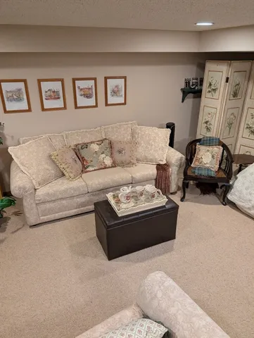 a living room with furniture and a couch