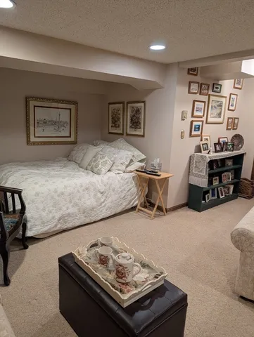 a bedroom with furniture and a couch