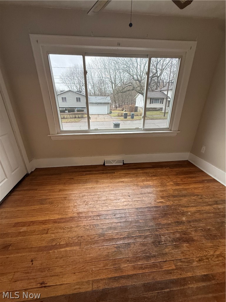 805 Carpenter Street Akron, OH 44310 - Photo 6 of 8 Empty room with hardwood / wood-style floors