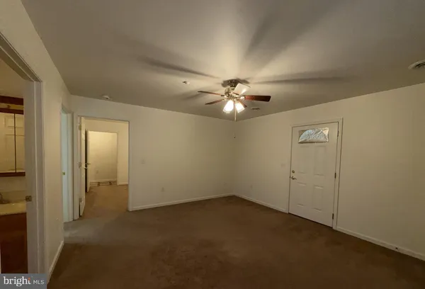 a bathroom with a shower and a toilet
