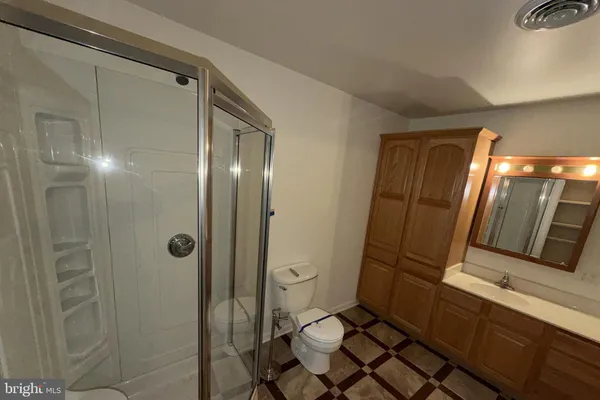 a view of a room with racks on the wall