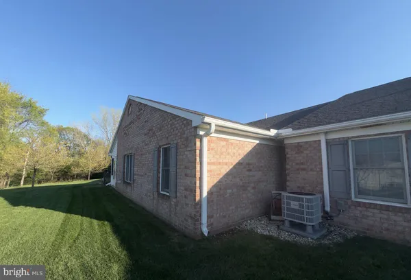 a view of a backyard of the house