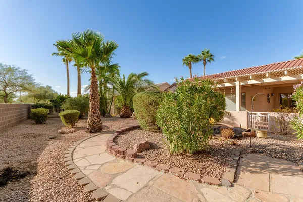 a view of a backyard with a garden