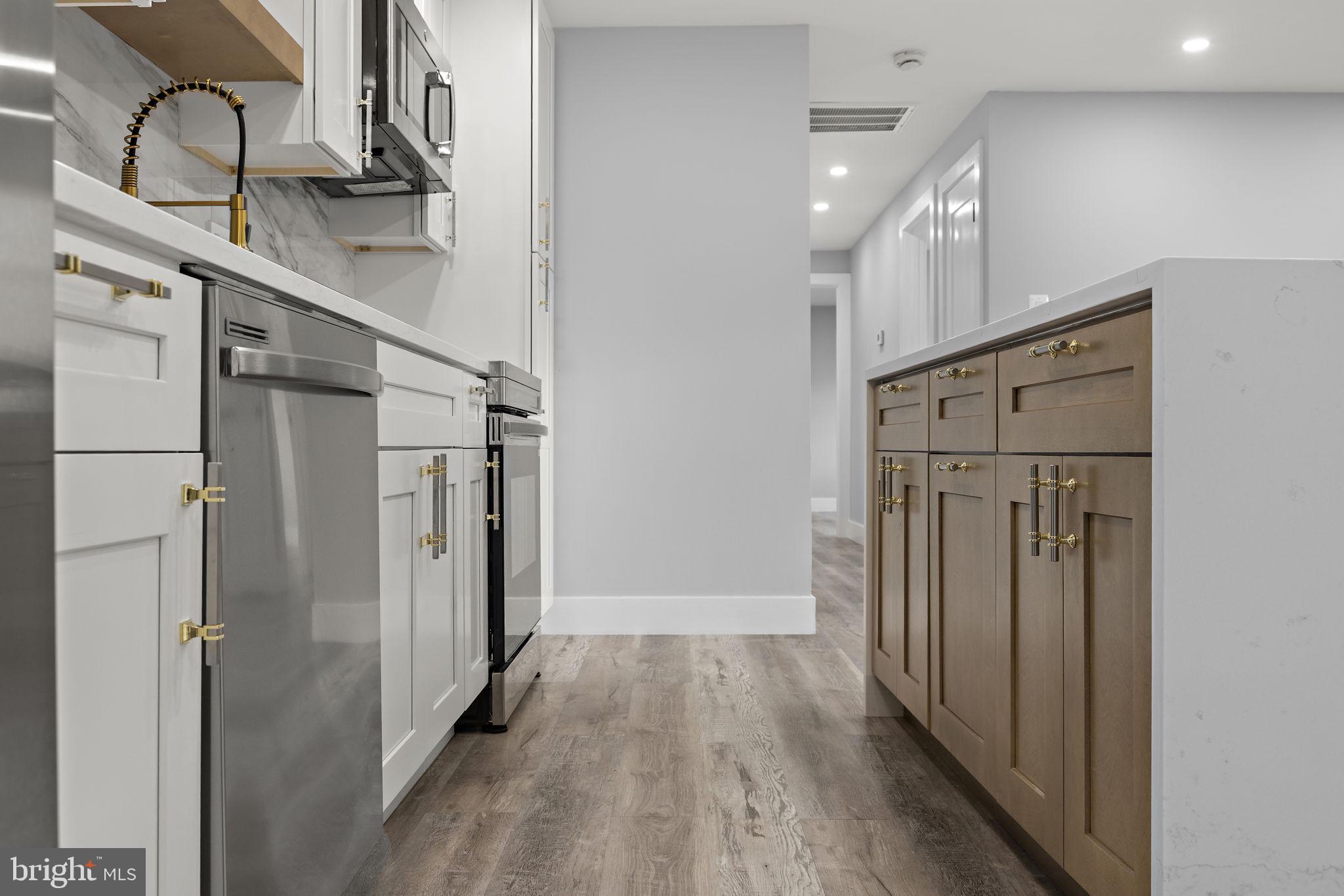 19605 Gunners Branch Road, Unit D Germantown, MD 20876 - Photo 13 of 36 a view of entryway with wooden floor