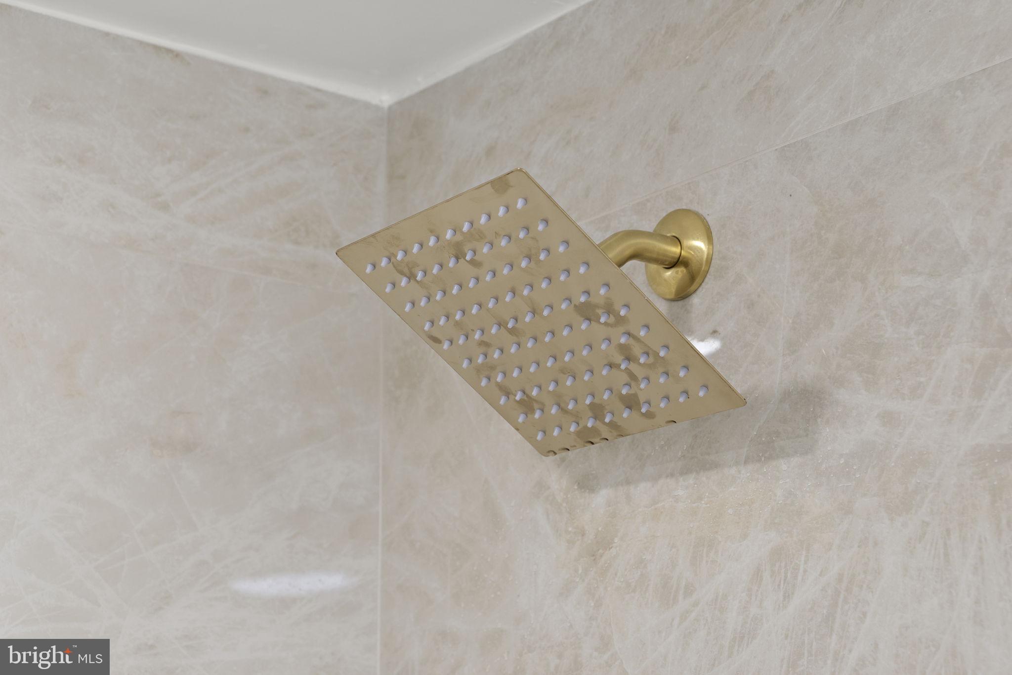 19605 Gunners Branch Road, Unit D Germantown, MD 20876 - Photo 19 of 36 a bathroom with a shower