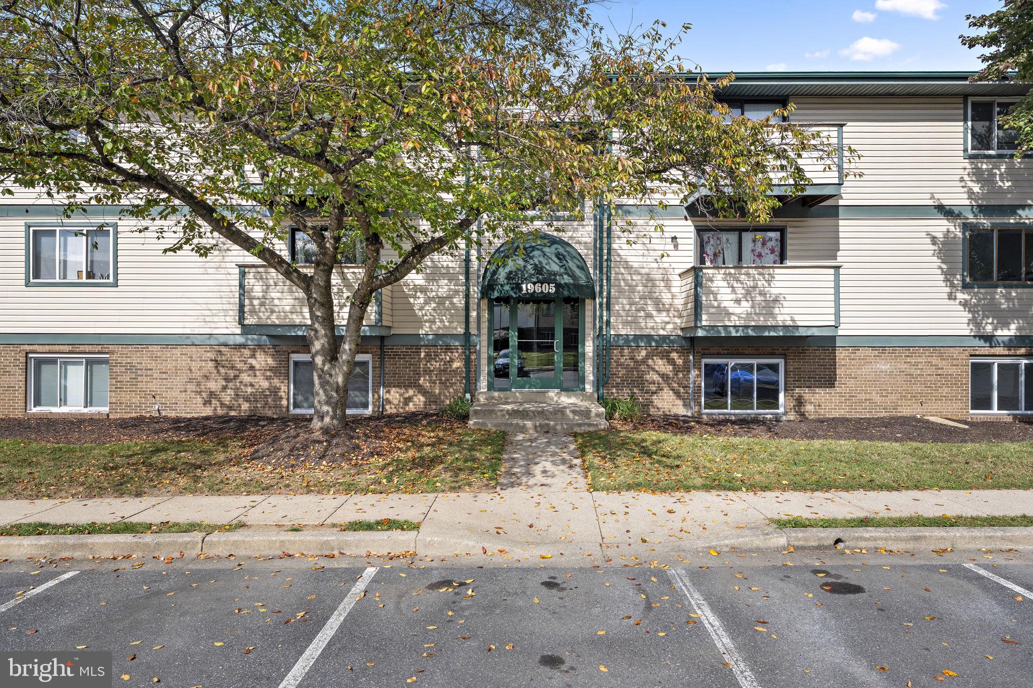 19605 Gunners Branch Road, Unit D Germantown, MD 20876 - Photo 2 of 36 a front view of a house with a tree