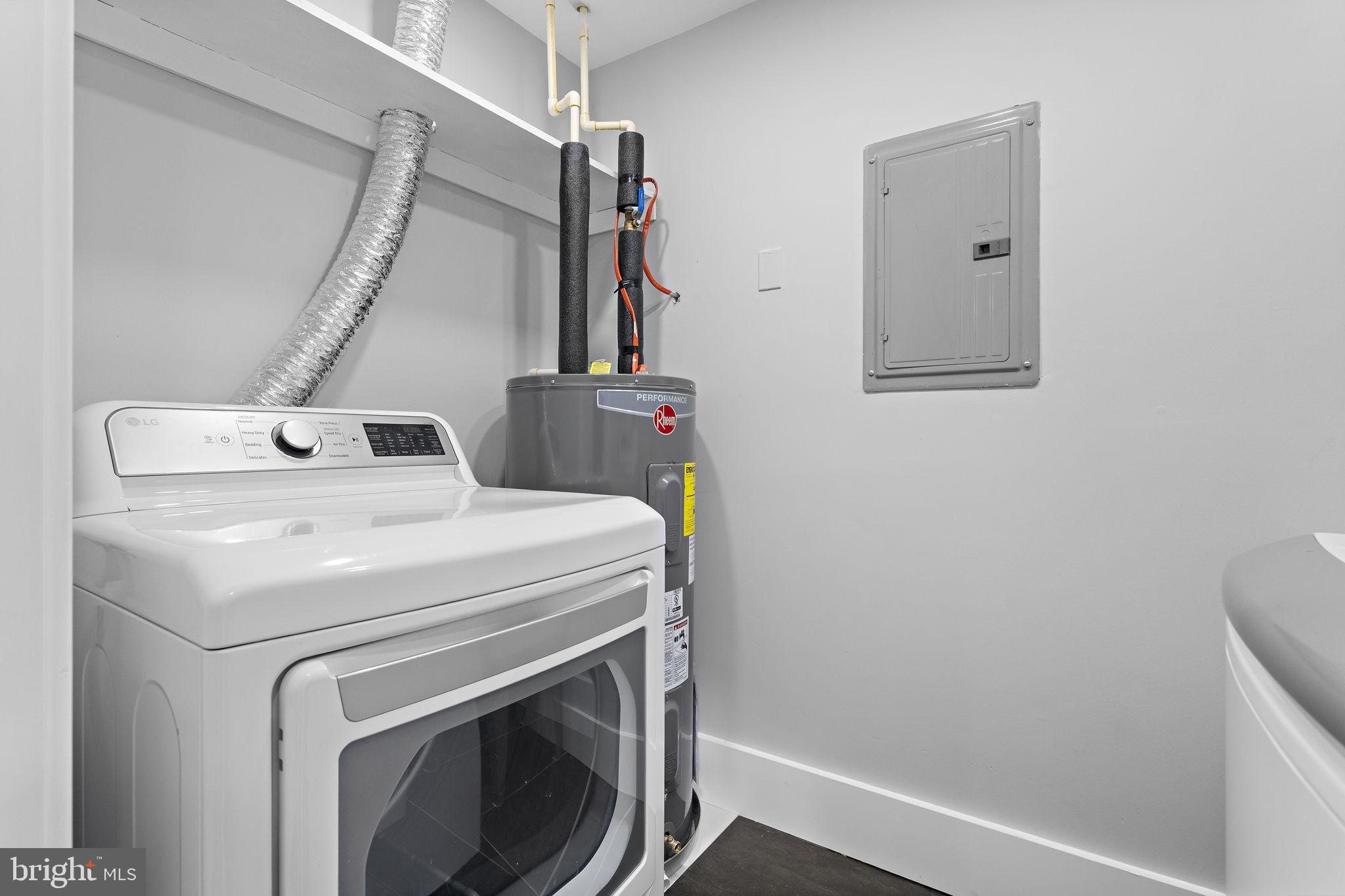 19605 Gunners Branch Road, Unit D Germantown, MD 20876 - Photo 25 of 36 a utility room with dryer and washer