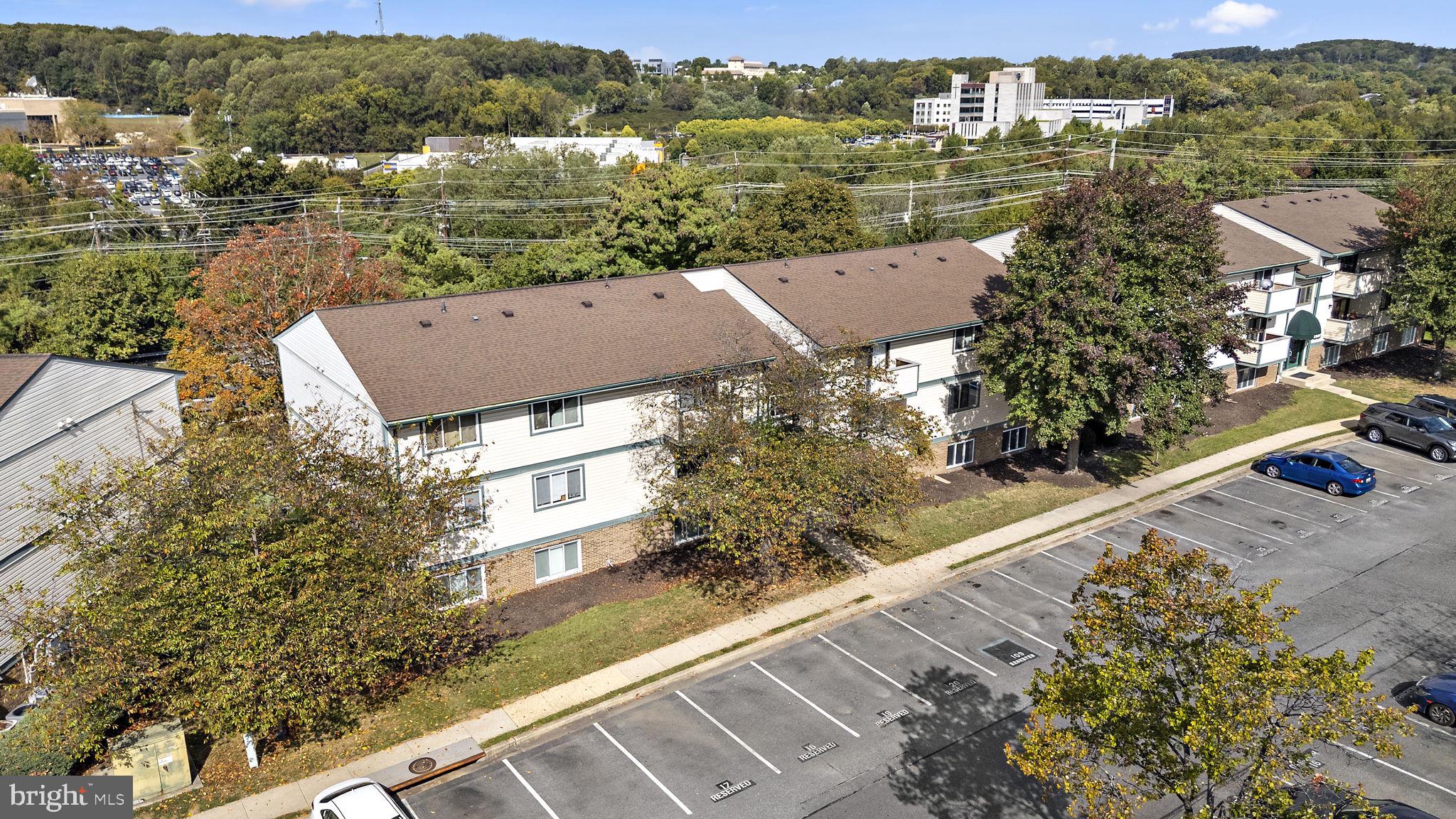 19605 Gunners Branch Road, Unit D Germantown, MD 20876 - Photo 28 of 36 an aerial view of residential houses with outdoor space