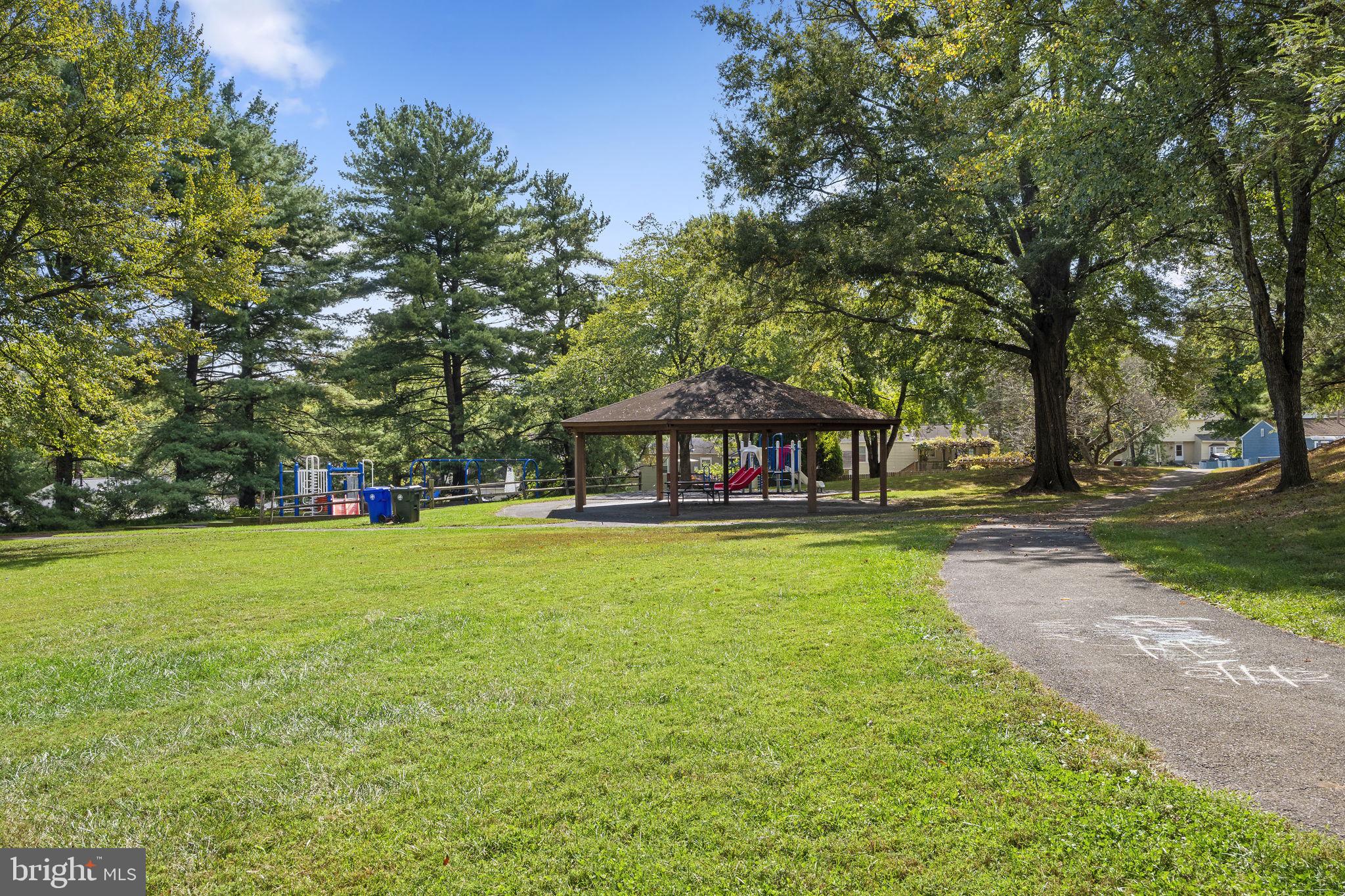19605 Gunners Branch Road, Unit D Germantown, MD 20876 - Photo 36 of 36 a view of a house with a yard