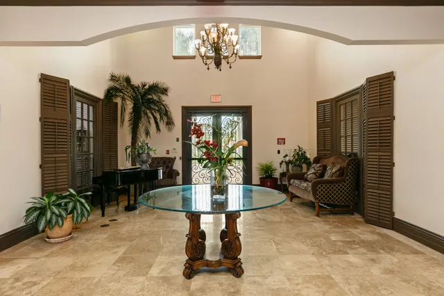 a kitchen with a table and chairs in it