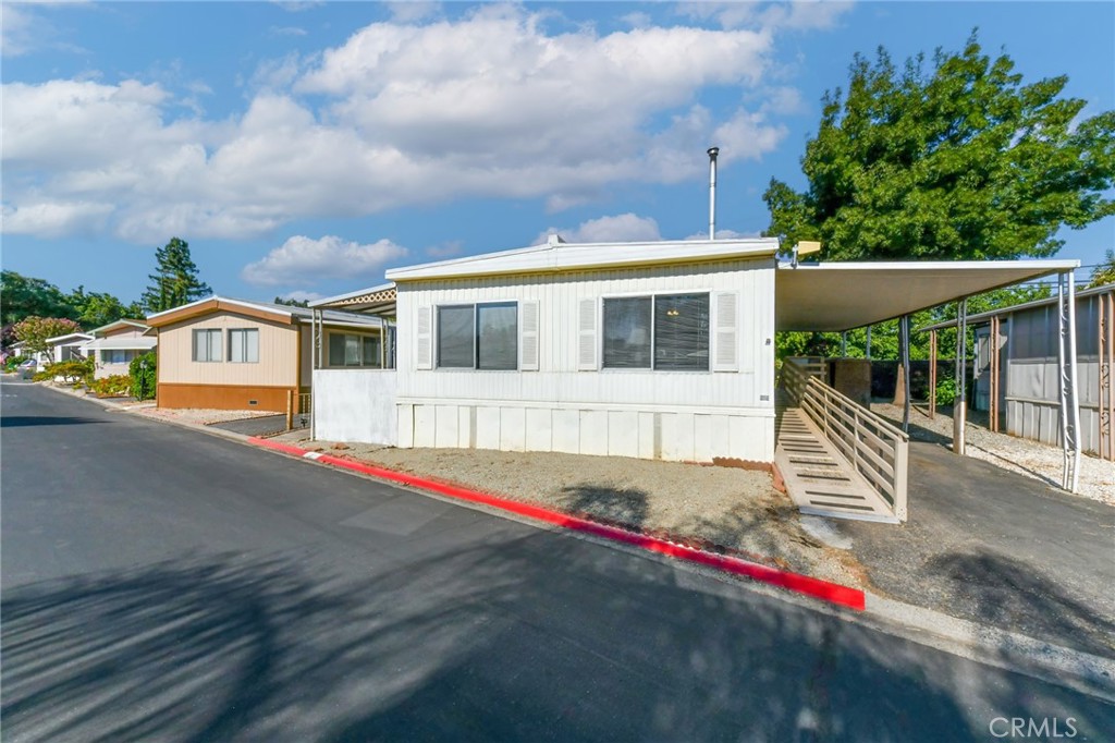 a view of street with large trees