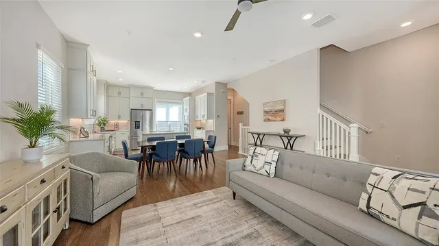 a kitchen with a stove a sink and a refrigerator