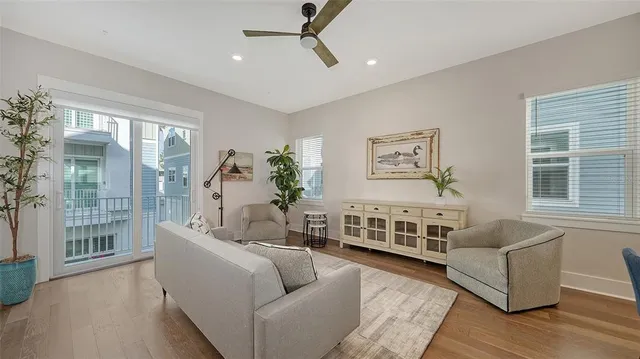 a view of a brick house with large windows