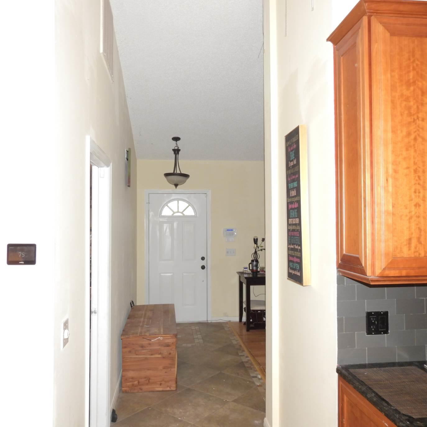 1470 Southeast Portillo Road Port St. Lucie, FL 34952 - Photo 36 of 42 Hallway to Front Door
