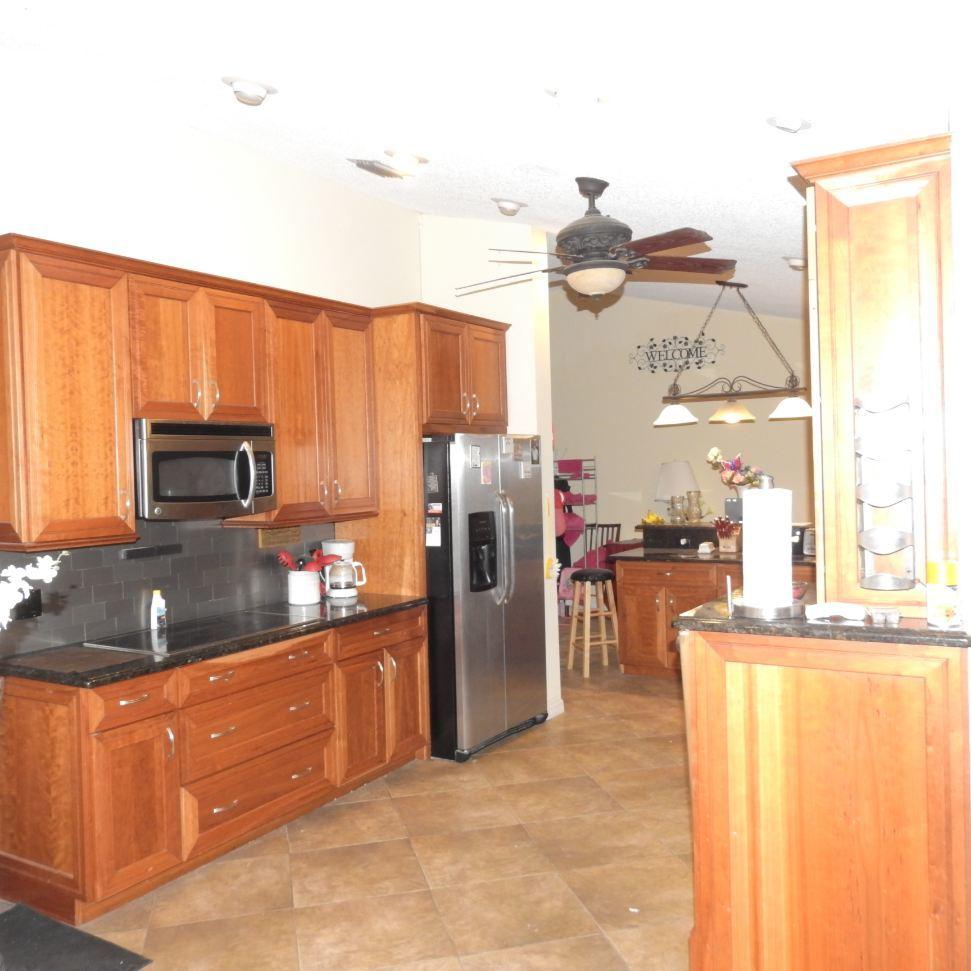 1470 Southeast Portillo Road Port St. Lucie, FL 34952 - Photo 5 of 42 Kitchen