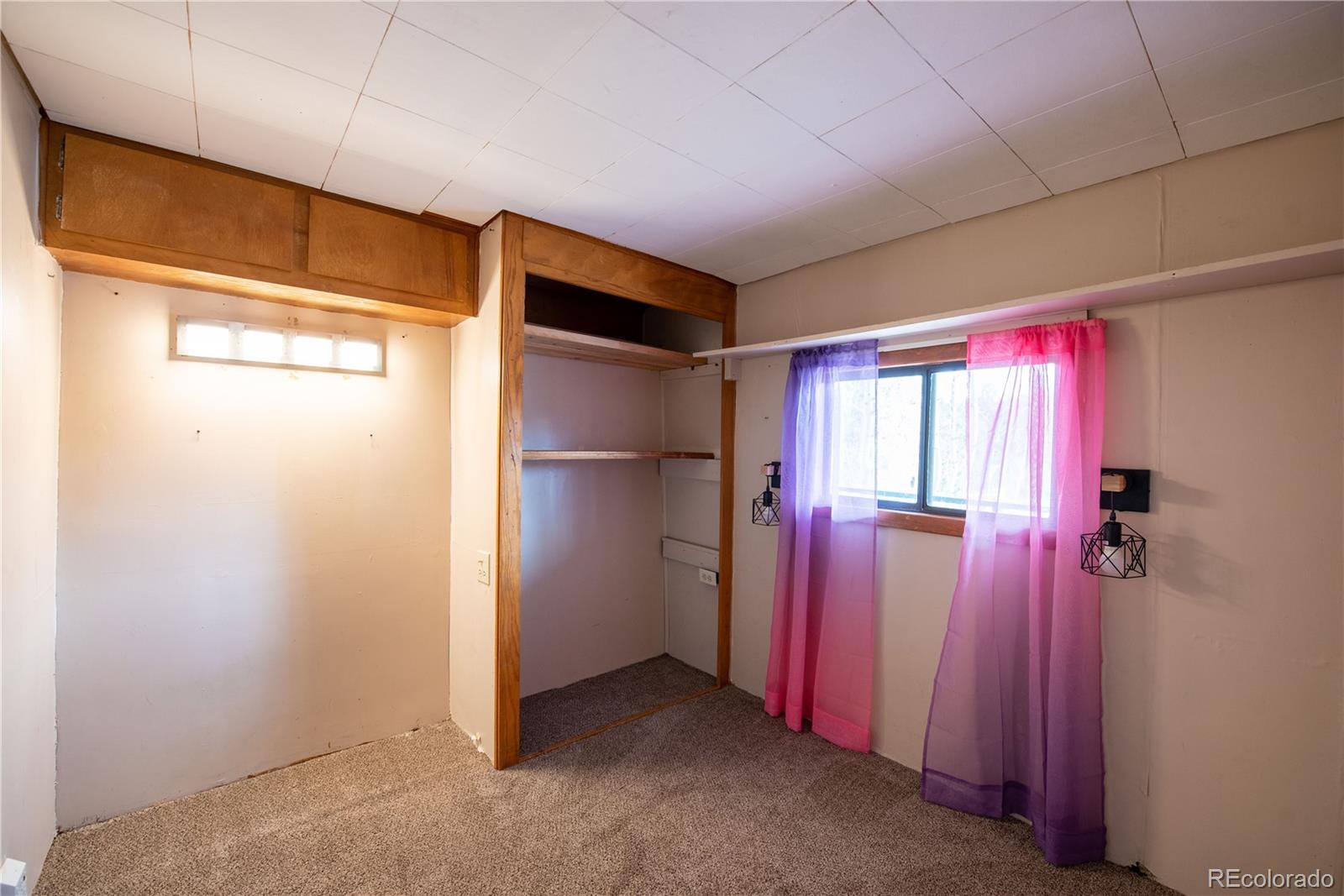 122 Neal Road Bailey, CO 80421 - Photo 17 of 25 a view of a room with closet area