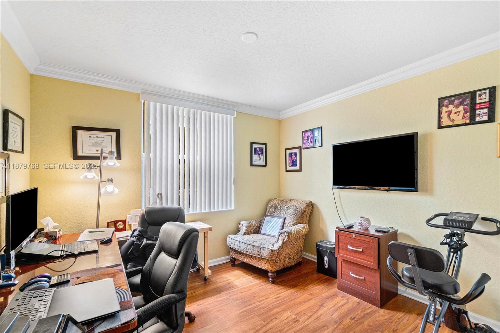 571 Calamint Point Royal Palm Beach, FL 33411 - Photo 17 of 51 a living room with furniture and a flat screen tv