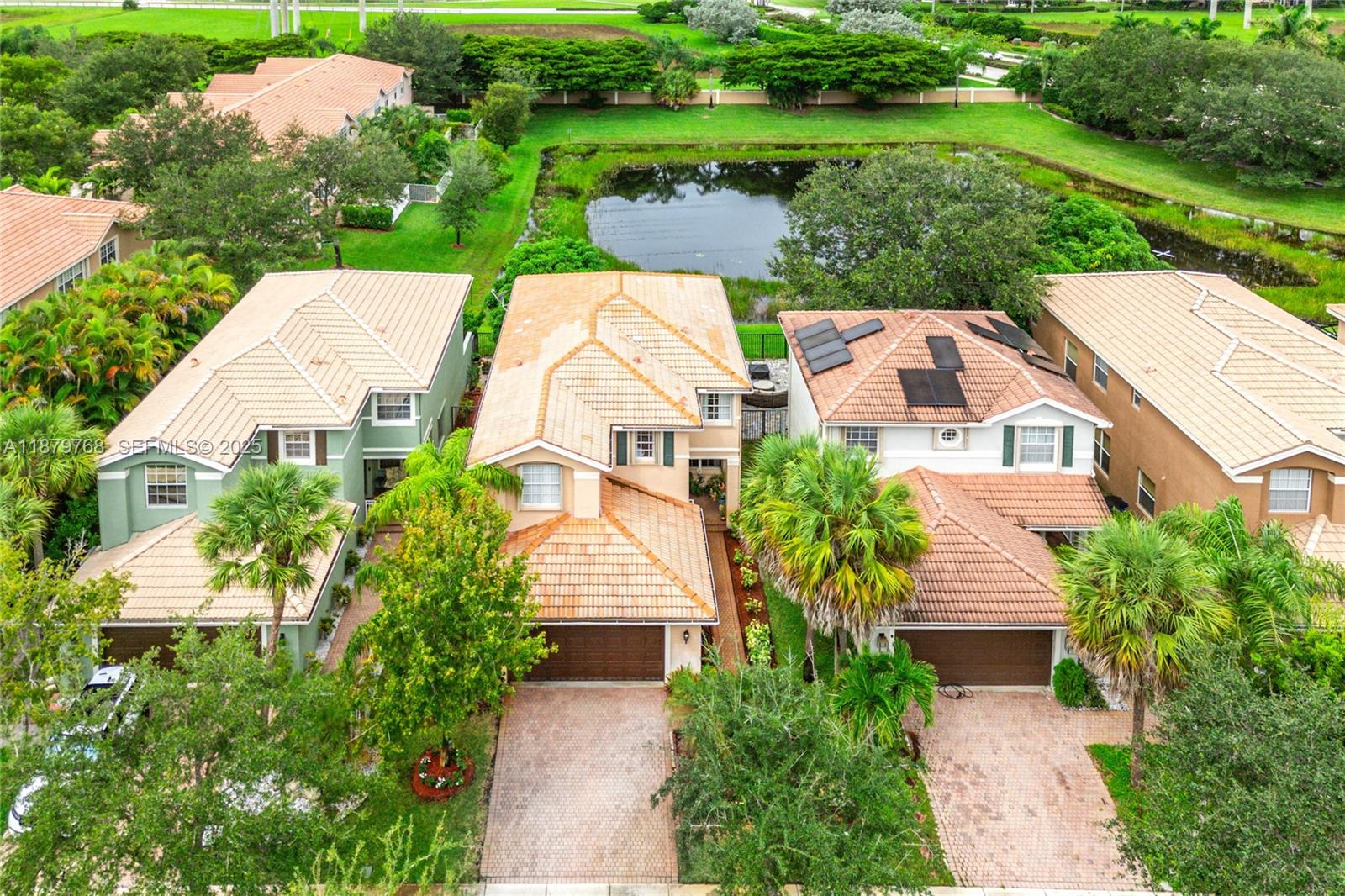 571 Calamint Point Royal Palm Beach, FL 33411 - Photo 38 of 51 an aerial view of a house