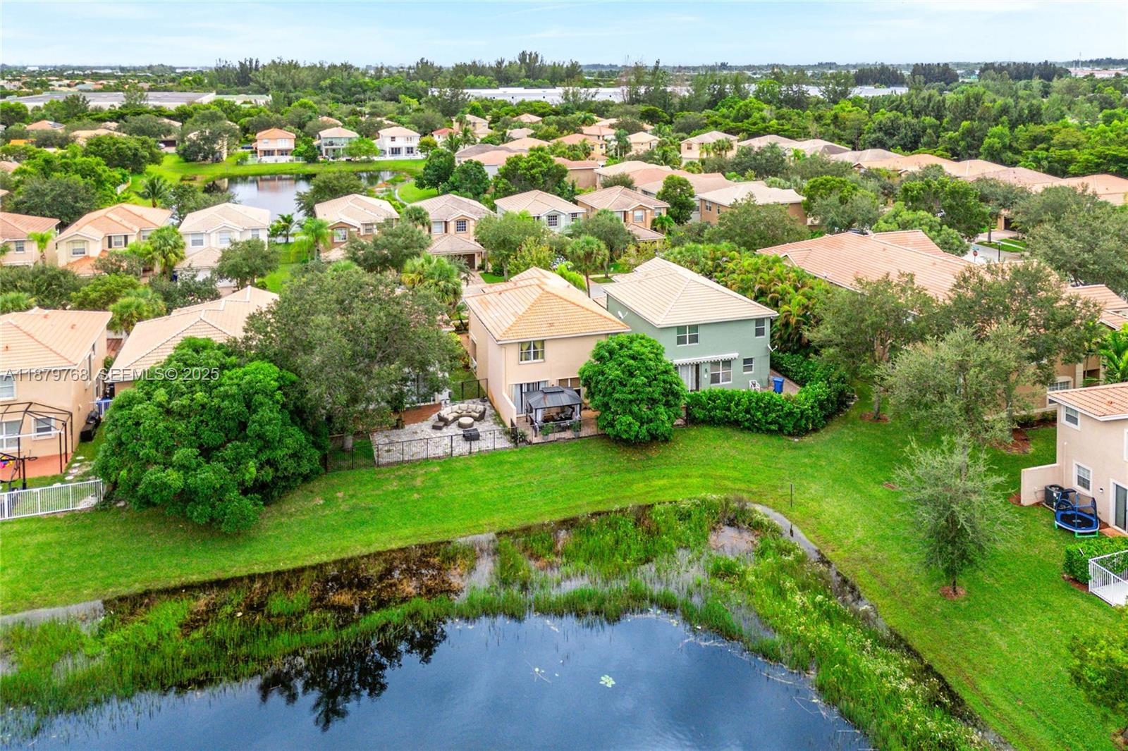 571 Calamint Point Royal Palm Beach, FL 33411 - Photo 45 of 51 an aerial view of residential houses with outdoor space and street view