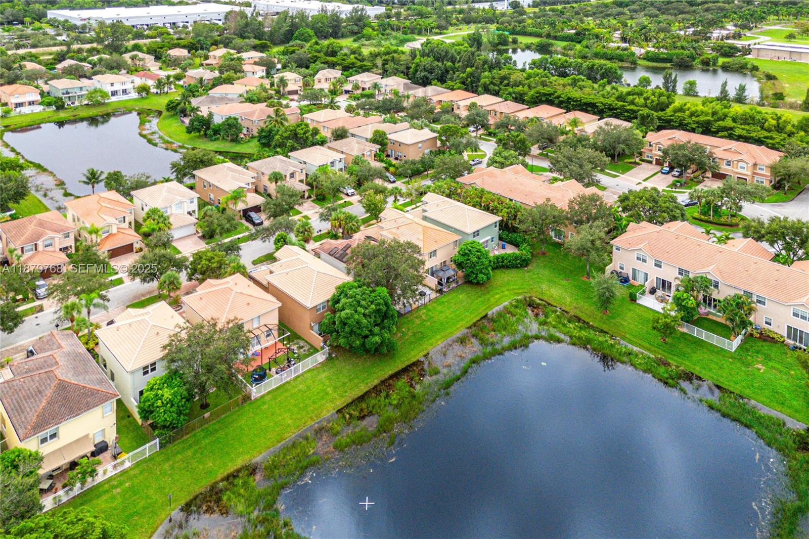 571 Calamint Point Royal Palm Beach, FL 33411 - Photo 47 of 51 an aerial view of a city