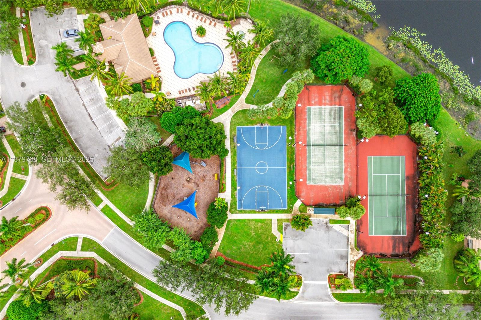 571 Calamint Point Royal Palm Beach, FL 33411 - Photo 51 of 51 an aerial view of a swimming pool