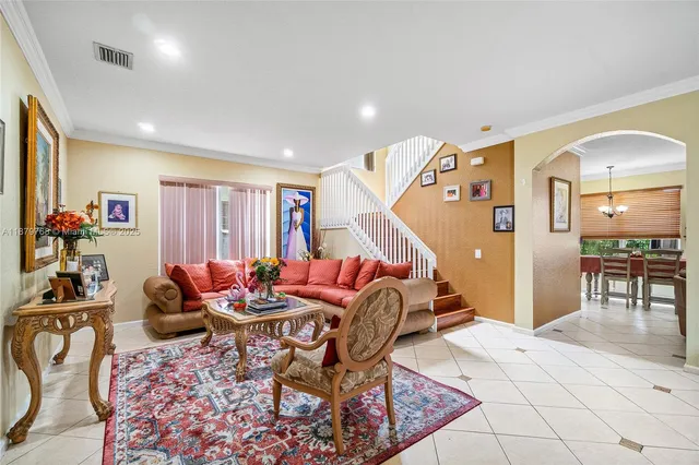 a dining room with furniture and a livingroom
