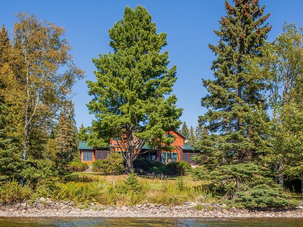 view of the house from the water. ...